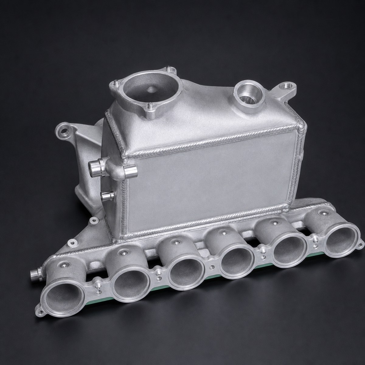 VCTR Performance BMW M3/M4 G80/G82 S58 Cast-End-Tank Intake Manifold Charge Cooler – side three-quarter view